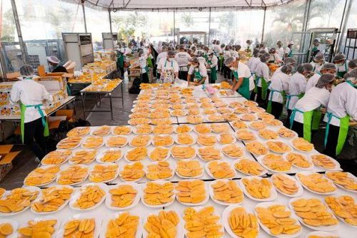 บรรยากาศงานเลี้ยงข้าวเหนียวมะม่วง ที่ทางภาครัฐหวังดึงนักท่องเที่ยวจีนให้กลับมาเที่ยวไทย / ภาพ : Bangkok Post